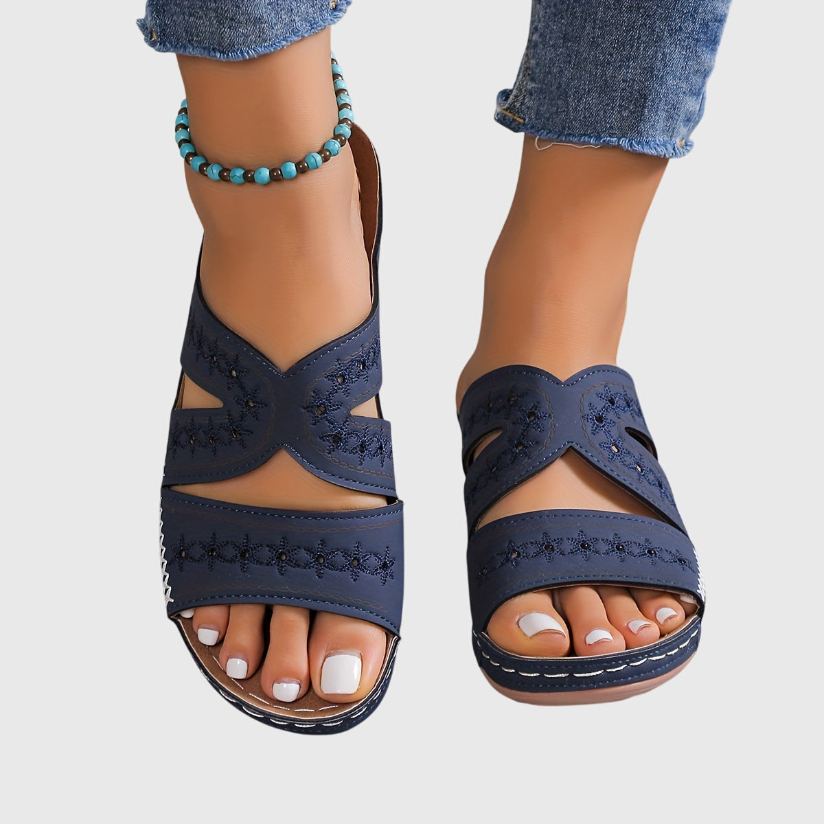 "Noëlle™ Lätta Ortopediska Sandaler" can be rewritten as "Noëlle™ Lightweight Orthopedic Sandals".
